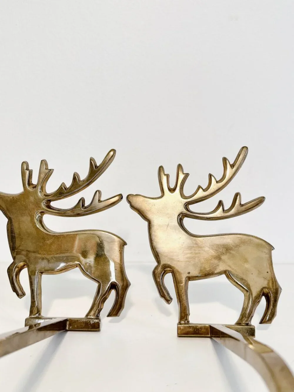 SET OF FOUR BRASS REINDEER MANTEL STOCKING HANGERS